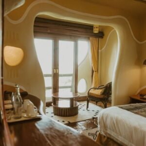 Mara serebadoubleroom African Paradise SafarisAfrican Safari Tour Holidays Mara Serena Safari Lodge overlooking the plains of the Mara Triangle